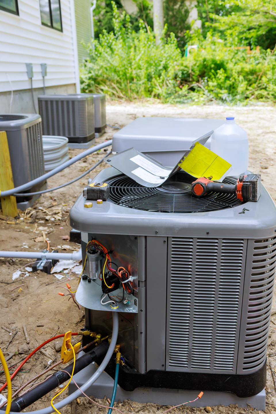 AC condenser unit opened for capacitor and wiring repair